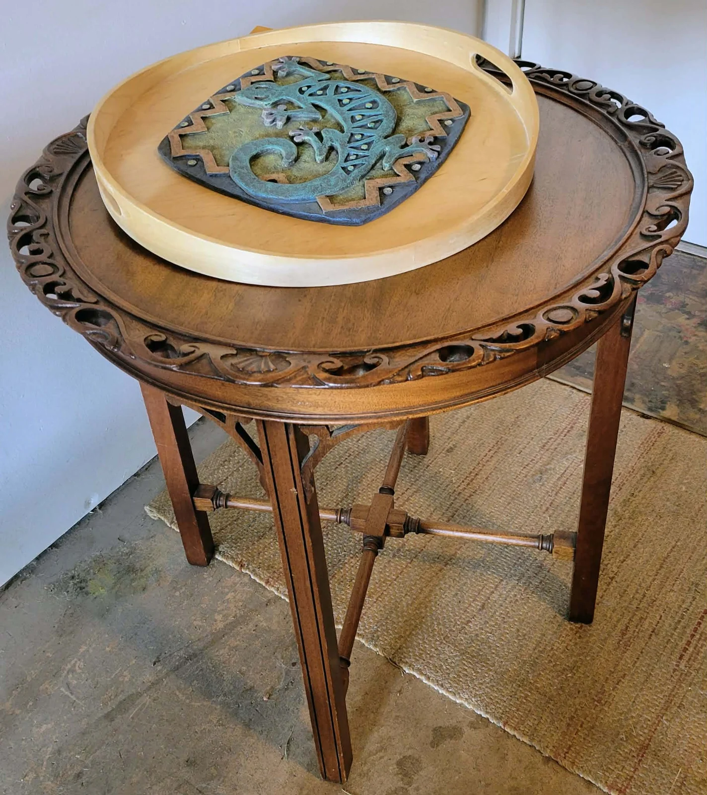 Reclaimed wooden table and tray with ceramic pieces ready to be repurposed.